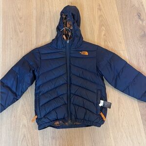 The North Face Blue Puffer Jacket with Orange Logo